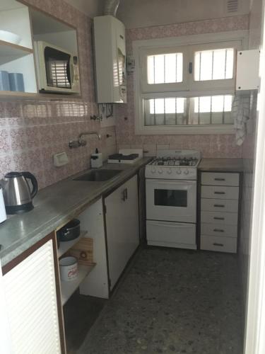 Kuchyň nebo kuchyňský kout v ubytování Silvestre