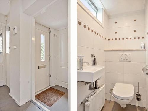 a white bathroom with a sink and a toilet at Holiday home with a garden and parking in Drachten