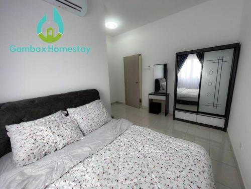 a bedroom with a bed and a window at Gembox Homestay near USIM#NETFLIX#WIFI100Mbps in Nilai