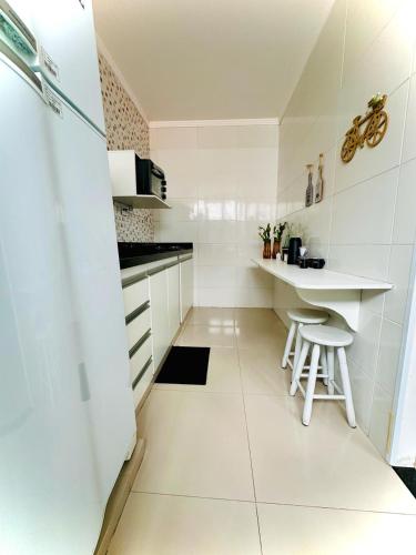 Dapur atau dapur kecil di Casa Sossego e Aconchego