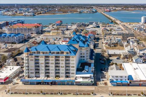 an aerial view of a city with a large building at 3 BR Belmont Towers on Boardwalk: Ocean & Bay Views in Ocean City