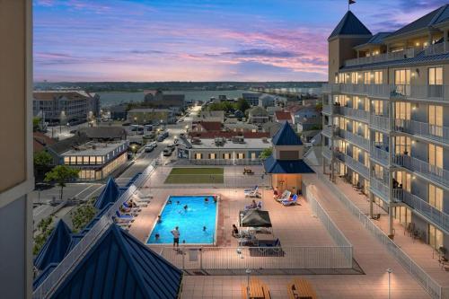 an aerial view of a city with a swimming pool at 3 BR Belmont Towers on Boardwalk: Ocean & Bay Views in Ocean City