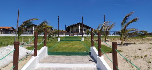 Zahrada ubytování THE FOUNTAINS 110 - Apartamento em lindo condomínio pé na areia da Praia das Fontes em Beberibe - CE