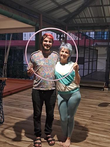 a man and a woman holding a hula hoop at Green View in Thekkady