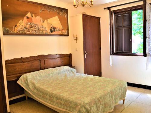 Кровать или кровати в номере Appartement Cavalaire-sur-Mer, 2 pièces, 4 personnes - FR-1-226B-19