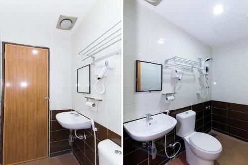 a bathroom with a toilet and a sink at MELUR HOTEL BANGI GATEWAY in Bandar Baru Bangi