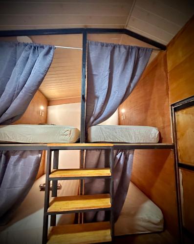 a couple of bunk beds in a room at Blasina el valle in Valle de Anton