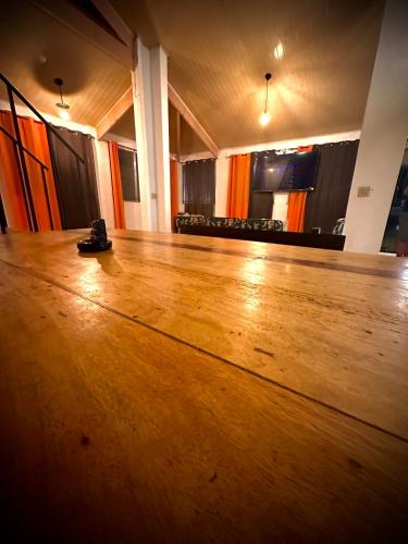 an empty dance floor with a pair of shoes on it at Blasina el valle in Valle de Anton