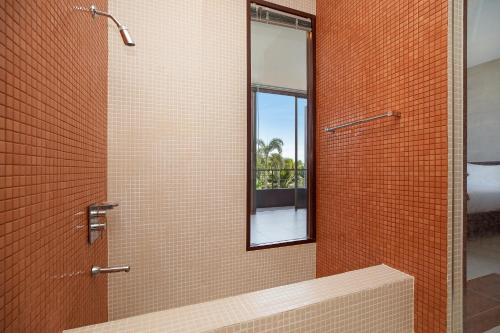 a bathroom with a shower with a mirror at 3BR Villa next MissionHills Golf Villa Argent 7 in Ban Muang Mai