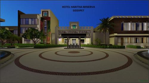 d'un bâtiment avec une cour dans l'établissement HOTEL HARITHA MINERVA, à Siddipet