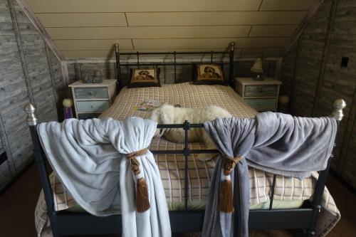Ένα ή περισσότερα κρεβάτια σε δωμάτιο στο La belle etage