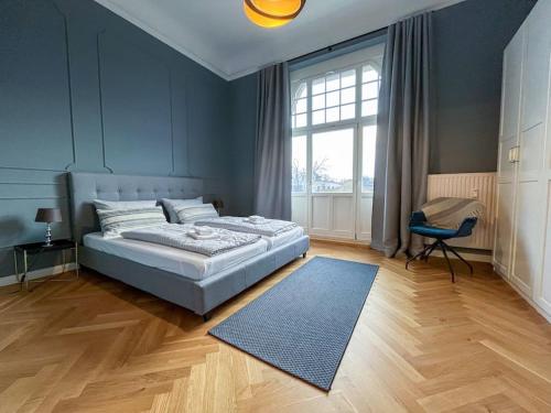 Giường trong phòng chung tại Wohnperle*GroßerGarten*Villa