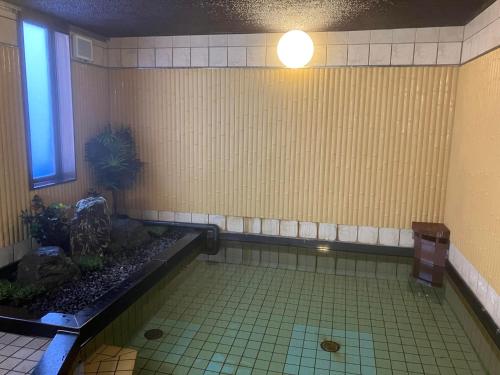 a bathroom with aificialificialificialificialificialificialificialificialificialificialificialificial at Yodoya in Toyooka