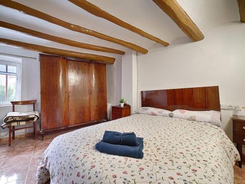 Katil atau katil-katil dalam bilik di Casa Rustica en Vilaverd