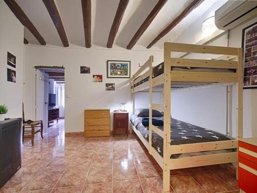 Katil atau katil-katil dalam bilik di Casa Rustica en Vilaverd