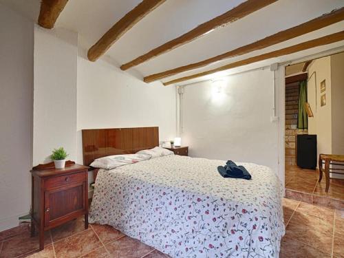 Katil atau katil-katil dalam bilik di Casa Rustica en Vilaverd