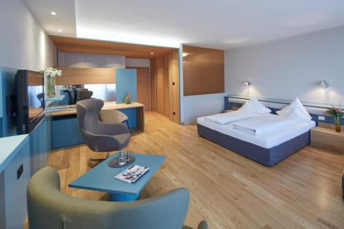 Postel nebo postele na pokoji v ubytování Parkhotel Marlena - Adults Only