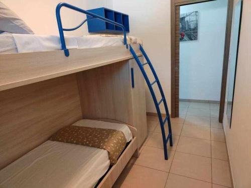 Postel nebo postele na pokoji v ubytování App Girasole 1a 300 metri dal mare in Salento
