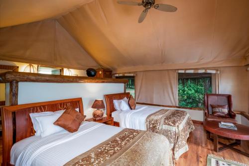 Postel nebo postele na pokoji v ubytování Chobe Safari Lodge-East Africa Uganda