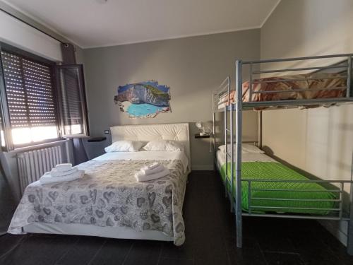 Ein Bett oder Betten in einem Zimmer der Unterkunft B&B Stazione37