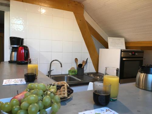 Köök või kööginurk majutusasutuses Les roses de Rita