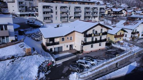 Alpha Apartments v zimě