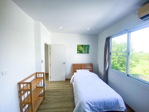 Ένα ή περισσότερα κρεβάτια σε δωμάτιο στο Townhome in Town