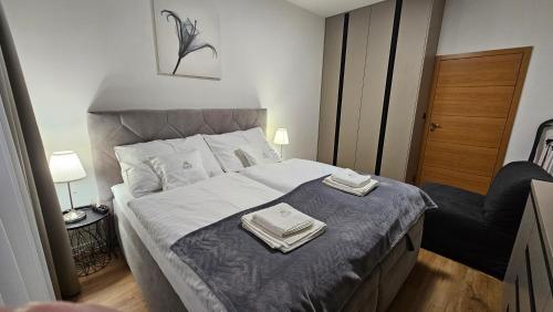 Ένα ή περισσότερα κρεβάτια σε δωμάτιο στο Apartmán Zina Donovaly