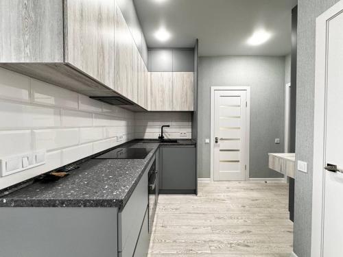 Kuchyň nebo kuchyňský kout v ubytování Arcadia Luxury Apartments