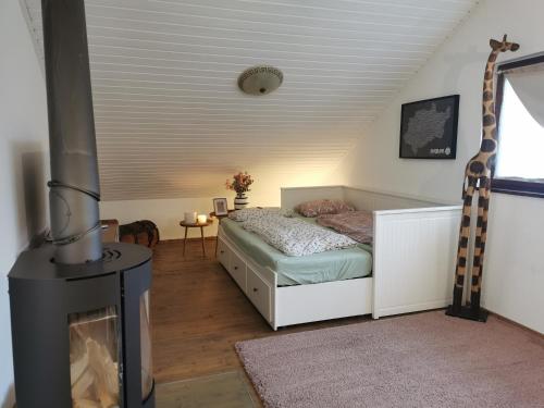 Postel nebo postele na pokoji v ubytování Wohnung in idyllischem Örtchen