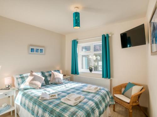 Ένα ή περισσότερα κρεβάτια σε δωμάτιο στο 2 Bed in Bridlington 77607