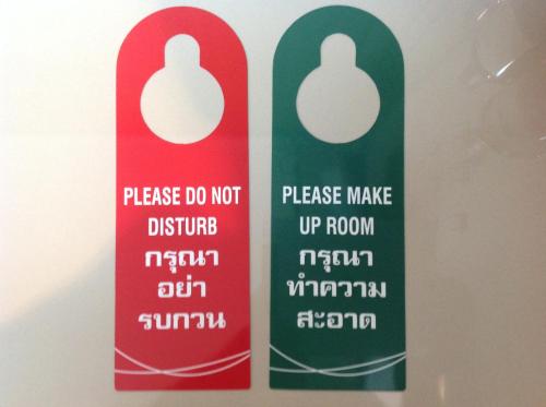 two snowboards with the words please do not disturb at Hideaway Guest House And Bar in Pattaya Central