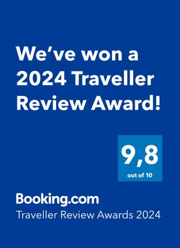 a blue sign that says weve won a traveler review award at Apartmány Semily in Semily