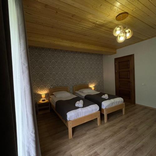 Margiansha House მარგიანშა სახლიにあるベッド