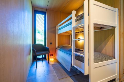 Arduenna Silva ecologic designer houseにあるベッド