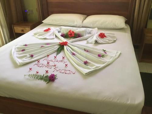 Ένα ή περισσότερα κρεβάτια σε δωμάτιο στο Benjamine's Guesthouse