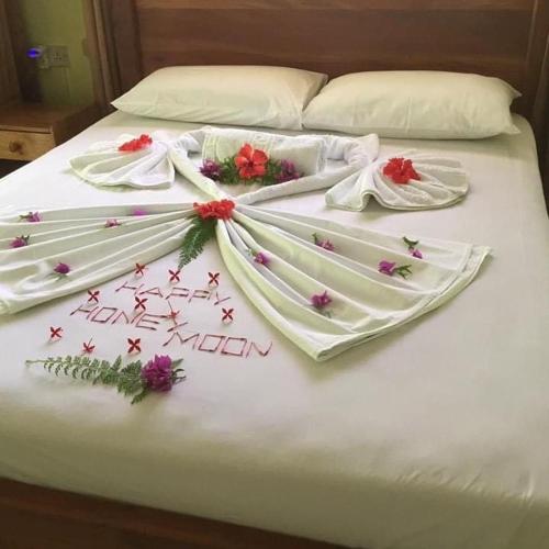 Ένα ή περισσότερα κρεβάτια σε δωμάτιο στο Benjamine's Guesthouse