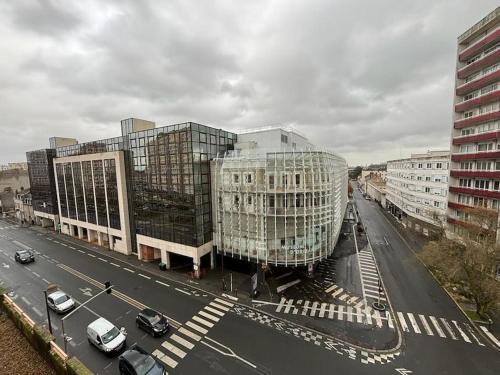 an aerial view of a city with buildings and a street at T3 pied de la gare + centre commercial TOUT inclus in Orléans