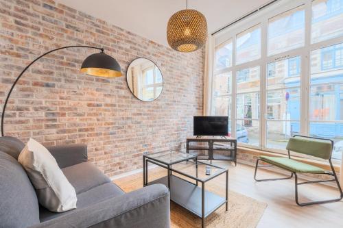 Un lugar para sentarse en Unique apartment in the Old Lille !
