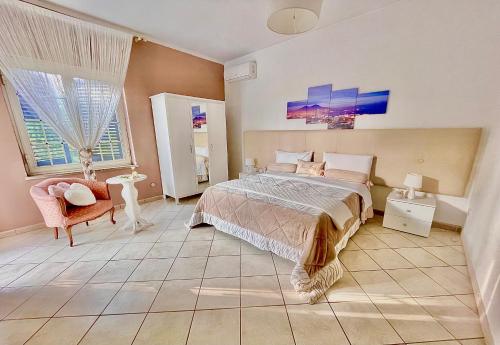 Postel nebo postele na pokoji v ubytování B&B Maison Blanche