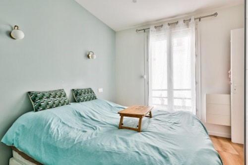 เตียงในห้องที่ Paris9