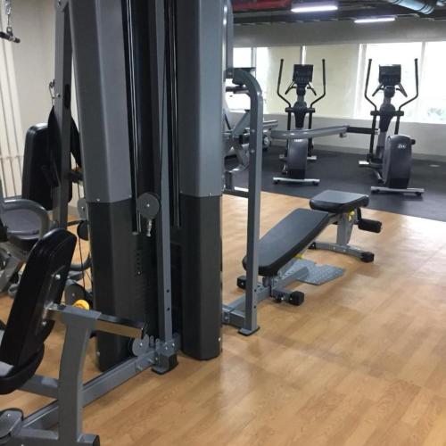 a gym with several rows of exercise bikes in it at Urban Haven with City Skyline View in Bacolod City in Bacolod