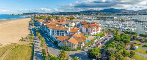 an aerial view of a resort on the beach at Hôtel Serge Blanco - Relais Thalasso & Spa in Hendaye