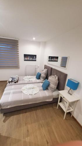 a living room with a couch and a table at TOUCH DOWN Motel in Lohmar