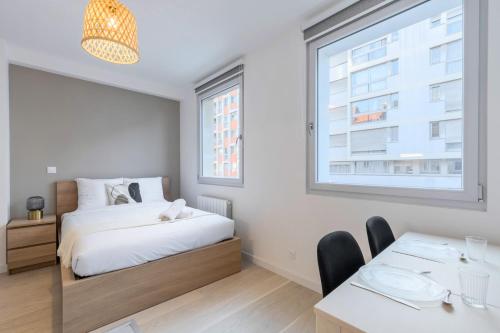 Posteľ alebo postele v izbe v ubytovaní Lille Saint-Michel Fully-equipped studio