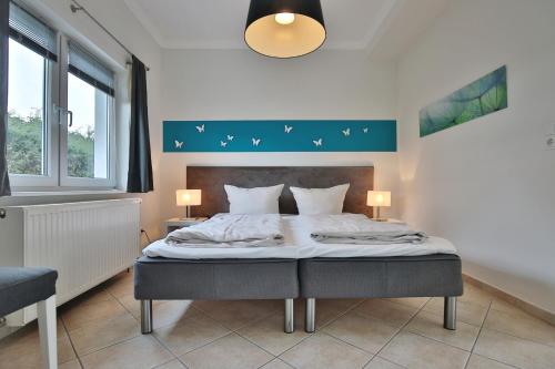 Postel nebo postele na pokoji v ubytování Ferienhaus Kiki Ferienhaus Kiki
