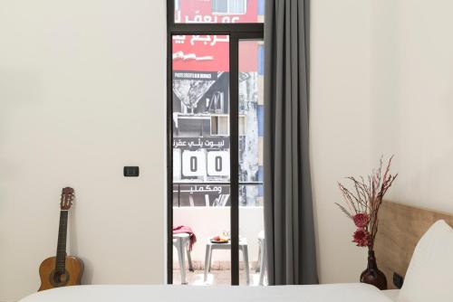 Katil atau katil-katil dalam bilik di Anoor Studios & Apartments in Gemmayze
