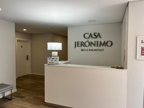 a waiting room with a csa sign on the wall at Casa Jerónimo B&B in Peso da Régua