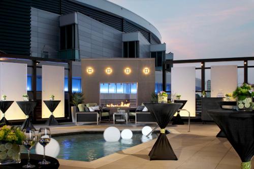 a house with a swimming pool and a patio at Hyatt House Charlotte Center City in Charlotte