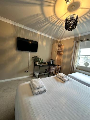 Cama o camas de una habitación en Lamp Light Rooms